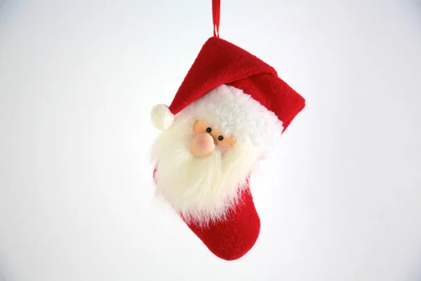 Christmas red boot in candle light across from the frozen window — Stock Photo, Image