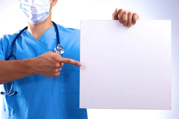 Surgeon in the mask holds a placard — Stock Photo, Image