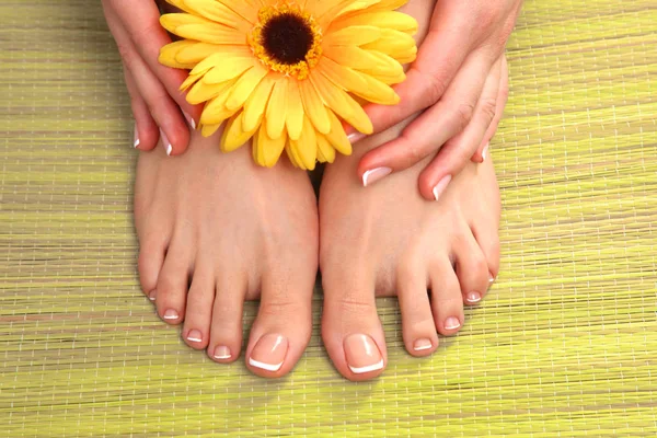 Closeup photo of a beautiful female feet with pedicure — Stock Photo, Image