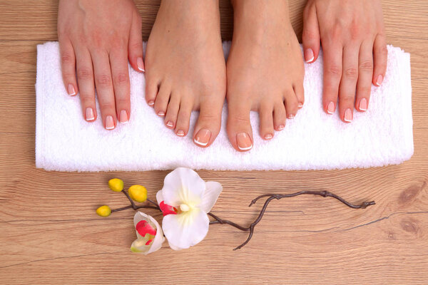 Closeup photo of a beautiful female feet with pedicure