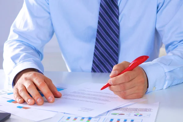 Businessman working at a desk computer graphics — Stock Photo, Image