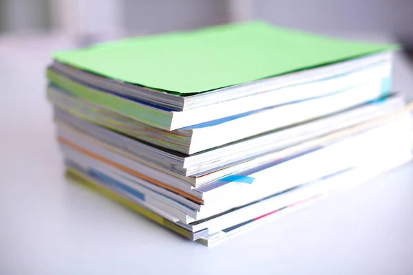 Close up of stack of papers on white background — Stock Photo, Image