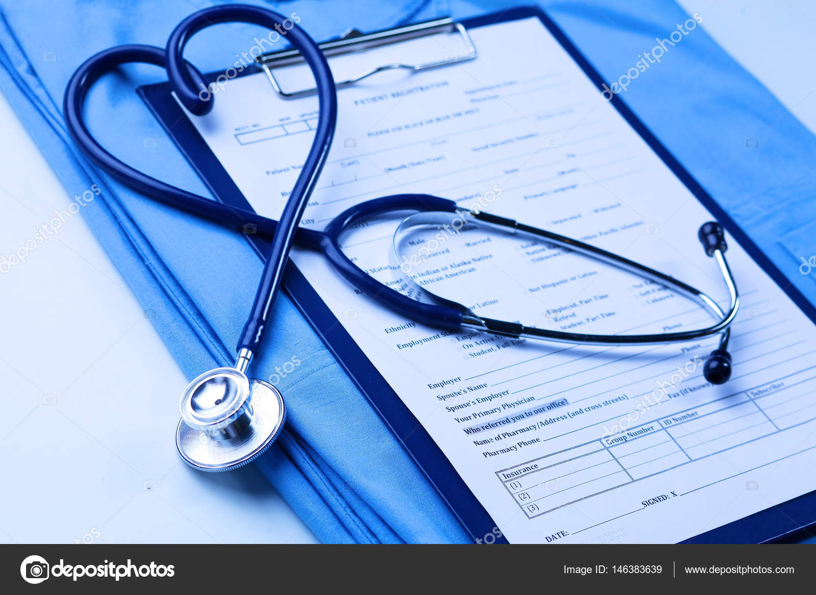 Medical Stethoscope Twisted In Heart Shape Lying On Patient Medical History  List And Blue Doctor Uniform Closeup Stock Photo, Picture and Royalty Free  Image. Image 80480561.