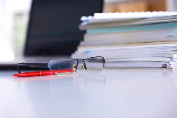 Group of multicolored office folders and glasses — Stock Photo, Image