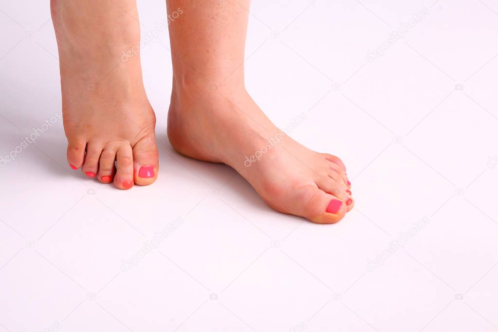 Closeup photo of a beautiful female feet with pedicure