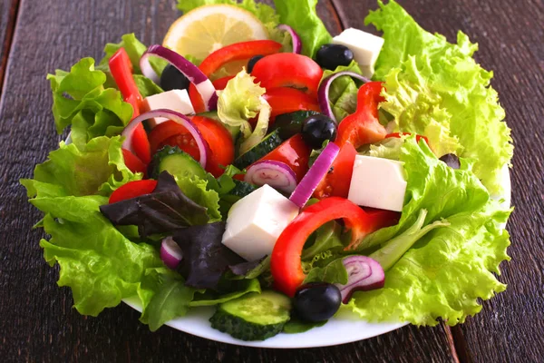 Fresh vegetables on wooden and blur background — Stock Photo, Image