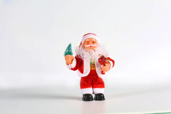 Happy Santa Claus Doll on Christmas time.colorful bokeh background — Stock Photo, Image