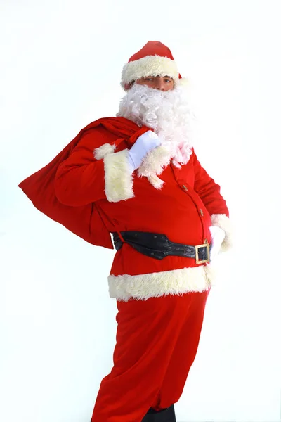 Papai Noel correndo com o saco dos presentes — Fotografia de Stock