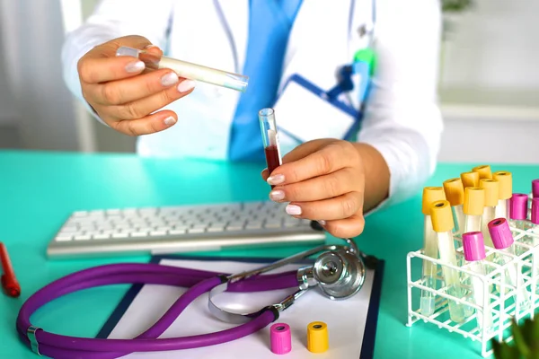 Woman doctor at the table in the office — Stock Photo, Image