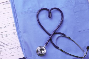 Stetoskop tıbbi üniforma ile bir tabloda