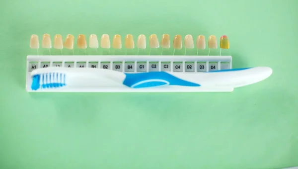 Dental model and dental equipment on blue background, concept image of dental background. dental hygiene background — Stock Photo, Image