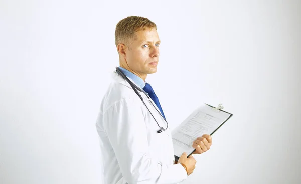Young confident doctor in a white coat with a stethoscope Stock Picture