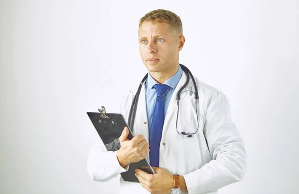 Young confident doctor in a white coat with a stethoscope — Stock Photo, Image