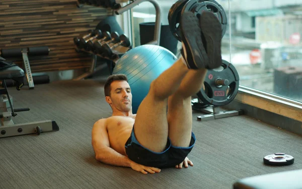 sporty man work out in gym