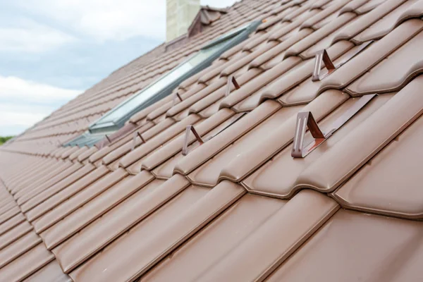 New roof with skylight, natural red tile and chimney. — Stock Photo, Image