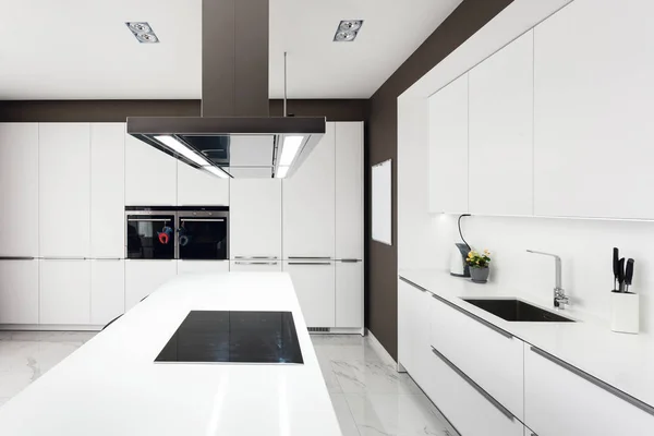 White modern kitchen with steel appliances. — Stock Photo, Image