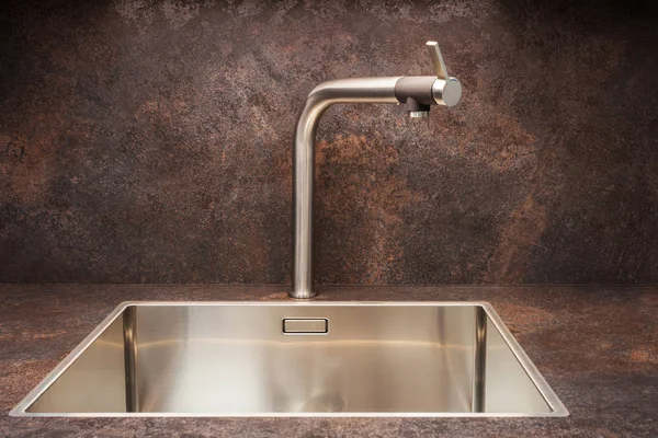 Modern designer chrome water tap over stainless steel kitchen sink — Stock Photo, Image