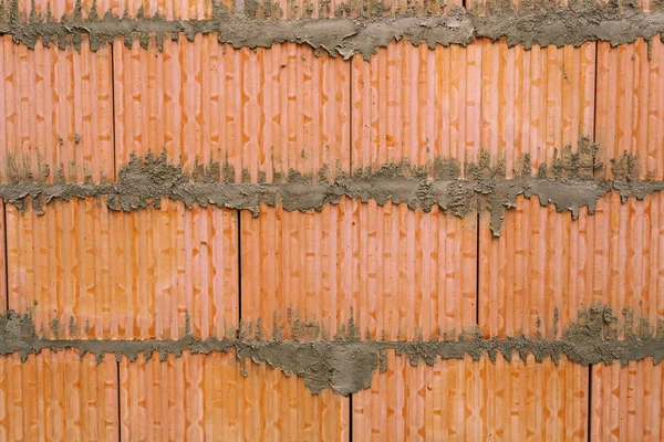 Hintergrund der Ziegelwand Textur in Haus im Bau. — Stockfoto