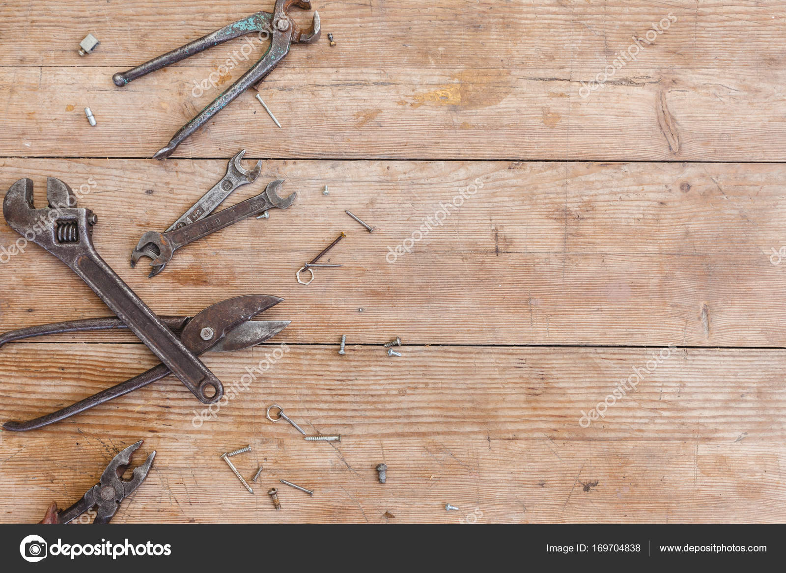 View Vintage Rusted Tools On Old Wooden Table Pliers Pipe Wrench Close Up View Vintage Rusted Tools On Old Wooden Table Pliers Pipe Wrench Driver Hammer Metal Shears Photo By Brizmaker