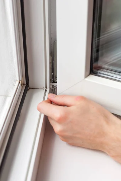 Handyman Repairs Plastic Window Hexagon Workman Adjusts Operation Plastic Window — Stock Photo, Image