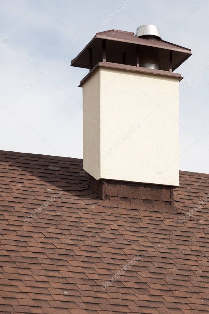 New asphalt tile roof with modular chimney