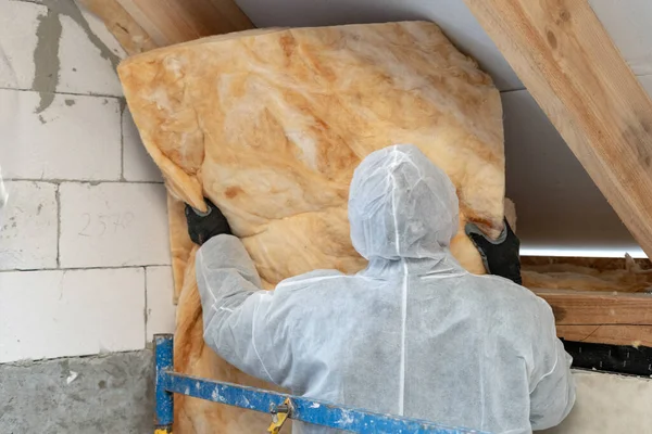 Back View One Professional Worker White Overalls Working Rockwool Insulation — Stock Photo, Image