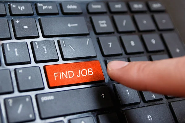 Close up of red button with text of FIND JOB on the black comput — Stock Photo, Image