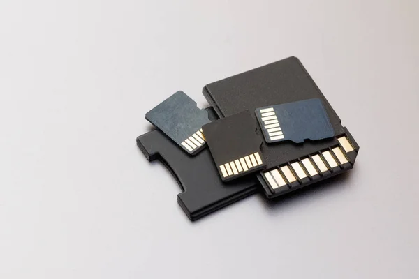 various sizes SD cards on a white background