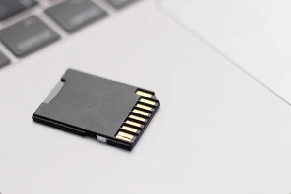 Micro SD Card on keyboard computer or laptop