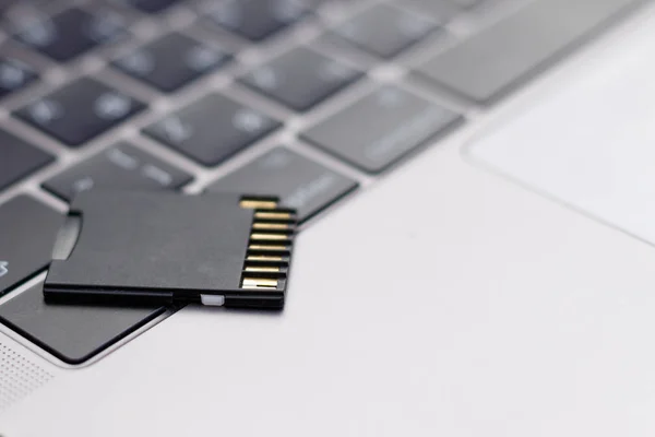 Micro SD Card on keyboard computer or laptop