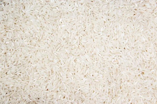 배경에 대 한 생 쌀된 흰 쌀입니다. 음식 개념. — 스톡 사진