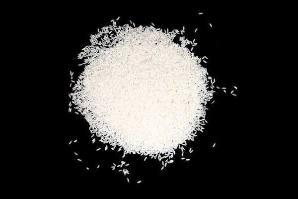 a bunch of white rice isolated on a black background. Chinese cu