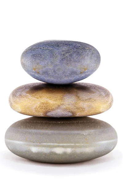 Stacked ornamental volcanic rocks. Zen stones stack. Spa stones treatment concept. Stacked ZEN Stones. White background and space for text. — Stock Photo, Image