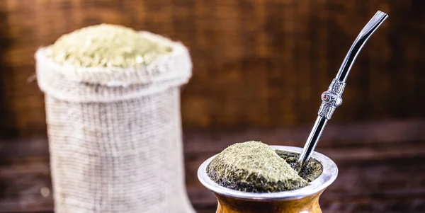 Gaucho Yerba Mate Tea The Chimarão Typical Brazilian Drink Traditionally In  A Cuiade Bombilla Stick Gourd Against Wooden Background Stock Photo -  Download Image Now - iStock