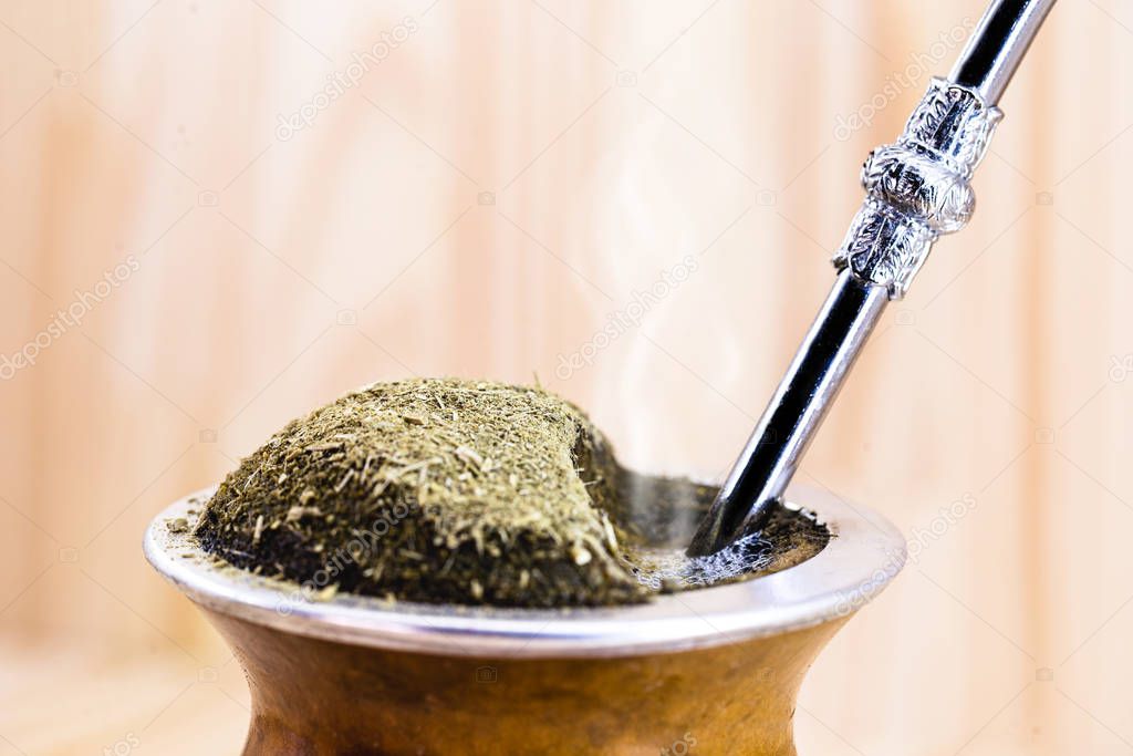 Chimarrão, or mate, is a characteristic drink of the culture of southern South America bequeathed by indigenous cultures. It consists of a gourd, a pump, ground yerba mate and warm water.