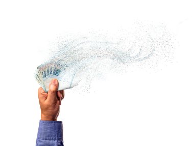 Brezilya 'dan gelen ve havada buharlaşan 100 reais' in banknotlarını tutan bir erkek. Brezilya para biriminin mali kaybı veya devalüasyonu kavramı.