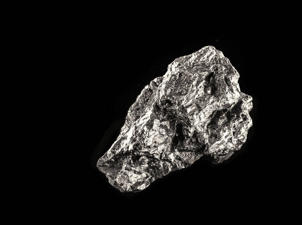 Tin is a chemical element with the symbol Sn, a pure tin nugget, used to produce various metal alloys used to coat other metals and protect them from corrosion