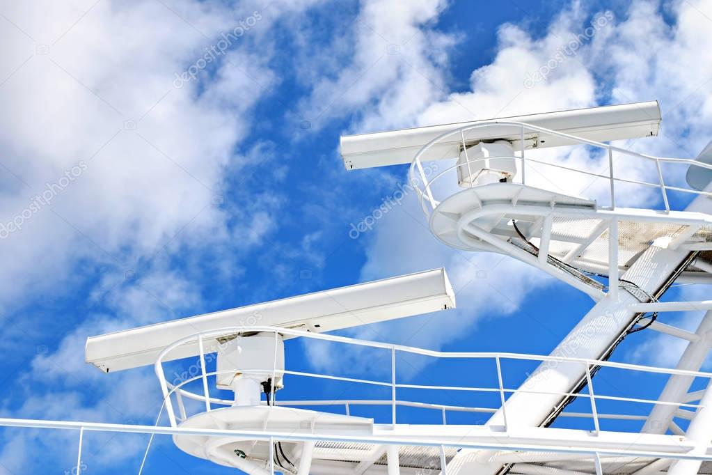 Radar systems on the mast of a large ship 