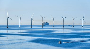 Offshore wind turbines on the coast of Copenhagen in Denmark clipart