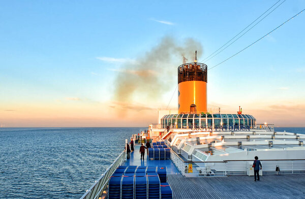 Baltic Sea, Germany - July 14, 2017: View over the outer deck of the cruise ship Costa Favolosa of the shipping company Costa Cruises during the voyage on the Baltic Sea in the evening.