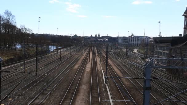 Aerial view of passenger trains passing at a Helsinki city station. — Stock Video