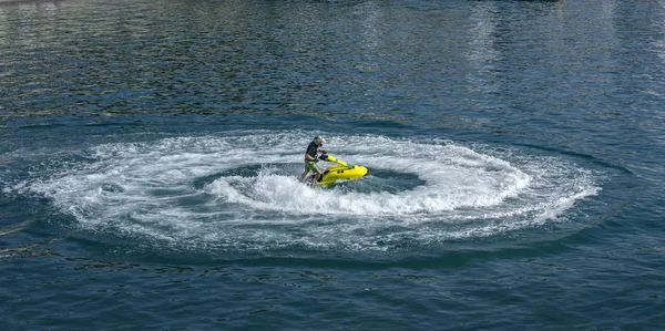 Water slalom on a water motorcycle — Stock Photo, Image