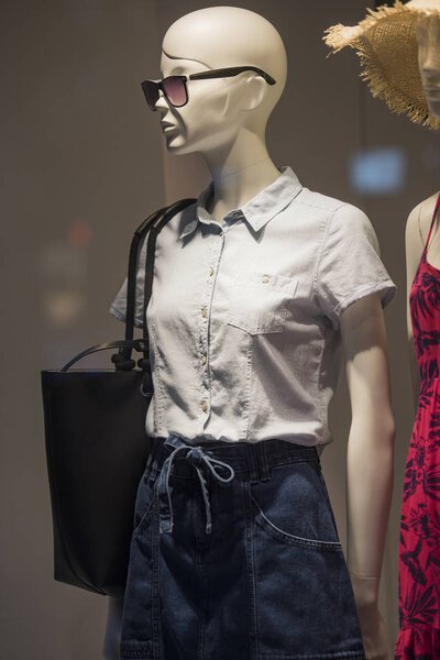 Mannequins in a showcase clothing store in Paris