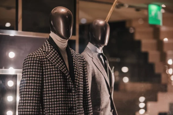 Suit in a showcase of a luxury store