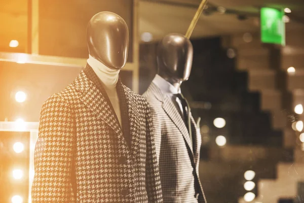 Suit in a showcase of a luxury store