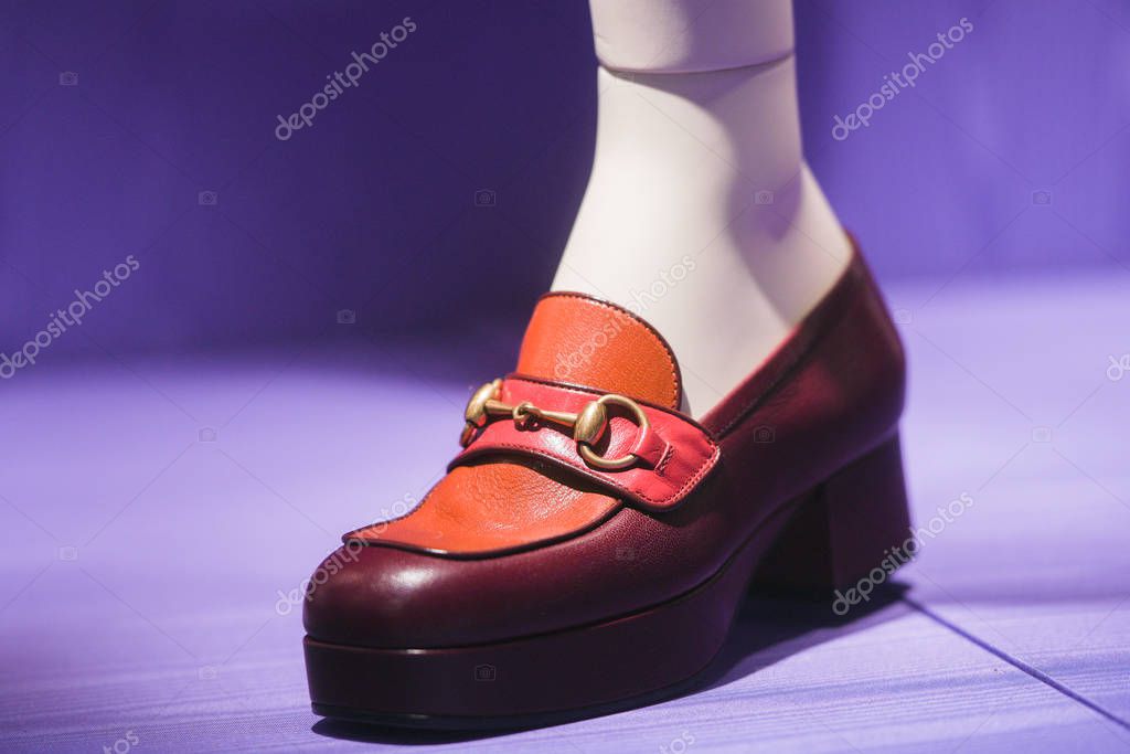 Milan, Italy - February 22, 2019:  Gucci shoes in a store in Milan.