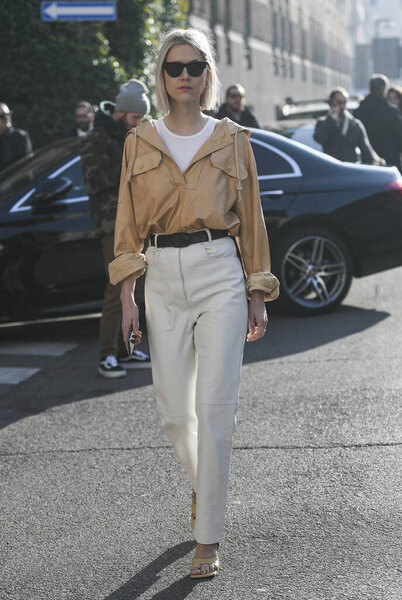 Milan, Italy - February 22, 2020: Street style appearance during Milan Fashion Week - streetstylefw20