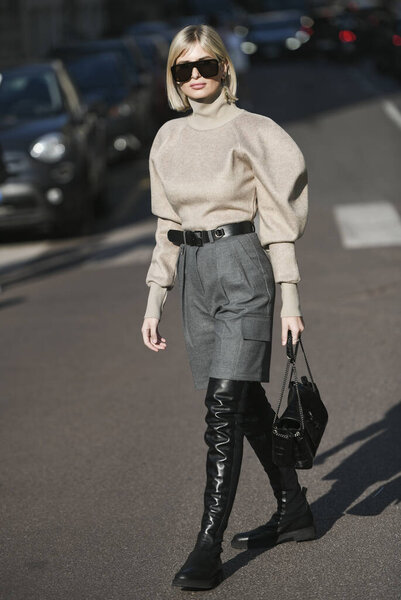Milan, Italy - February 22, 2020: Street style appearance during Milan Fashion Week - streetstylefw20