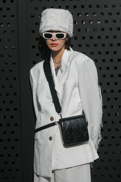 Milan, Italy - February 19, 2020: Street style appearance during Milan Fashion Week - streetstylefw20