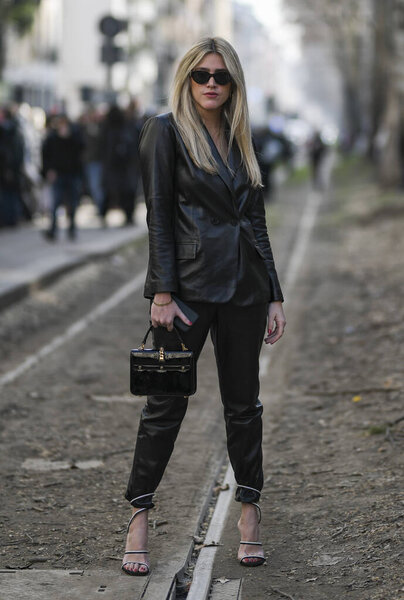 Milan, Italy - February 23, 2020: Street style appearance during Milan Fashion Week - streetstylefw20